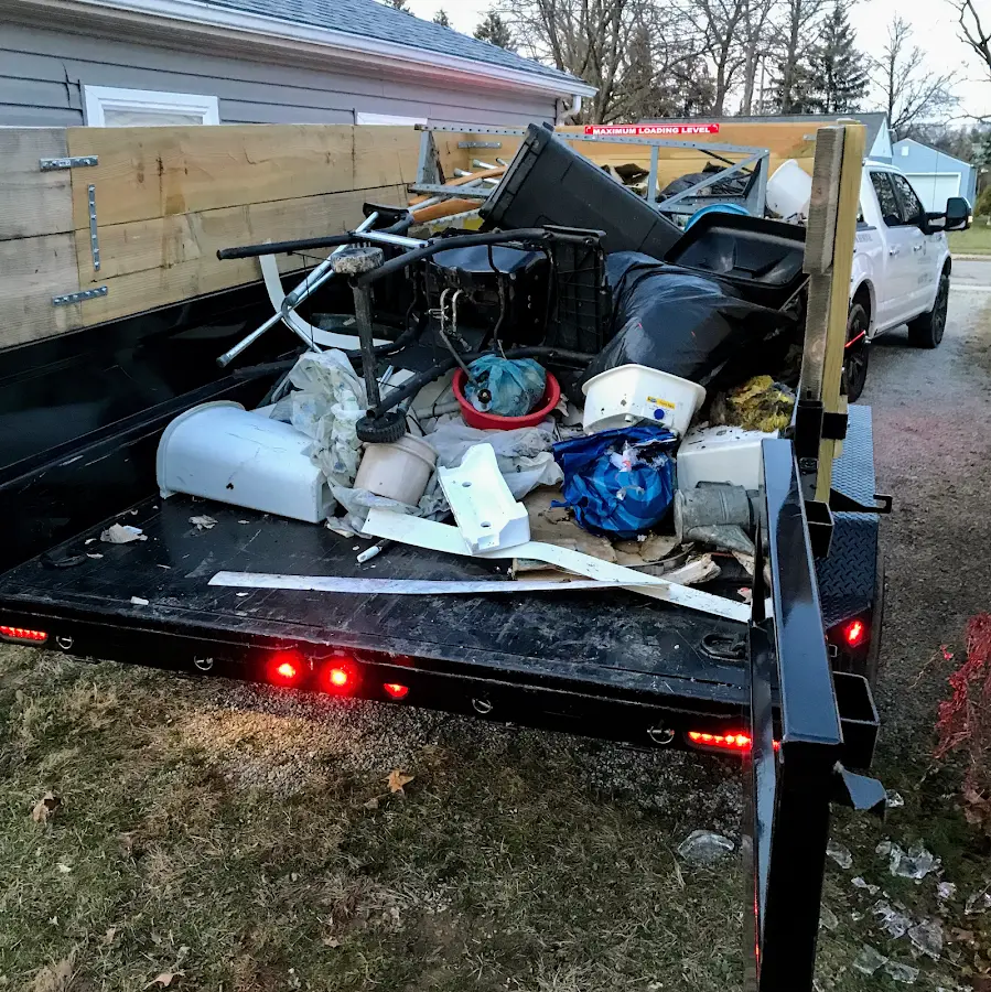 Roll-off dumpster delivered to a residential driveway in Taylor